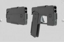 Пистолет маскируется под смартфон Двуствольный 9-миллиметровый пистолет похож